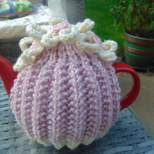 Small pink tea cosy