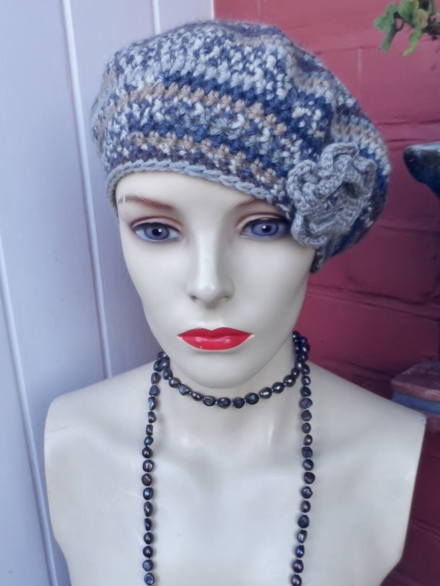 Cloche hat in a soft grey, taupe and cream wool with a detachable corsage brooch