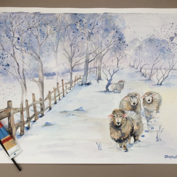 Original watercolour painting of winter landscape with sheep in snow.