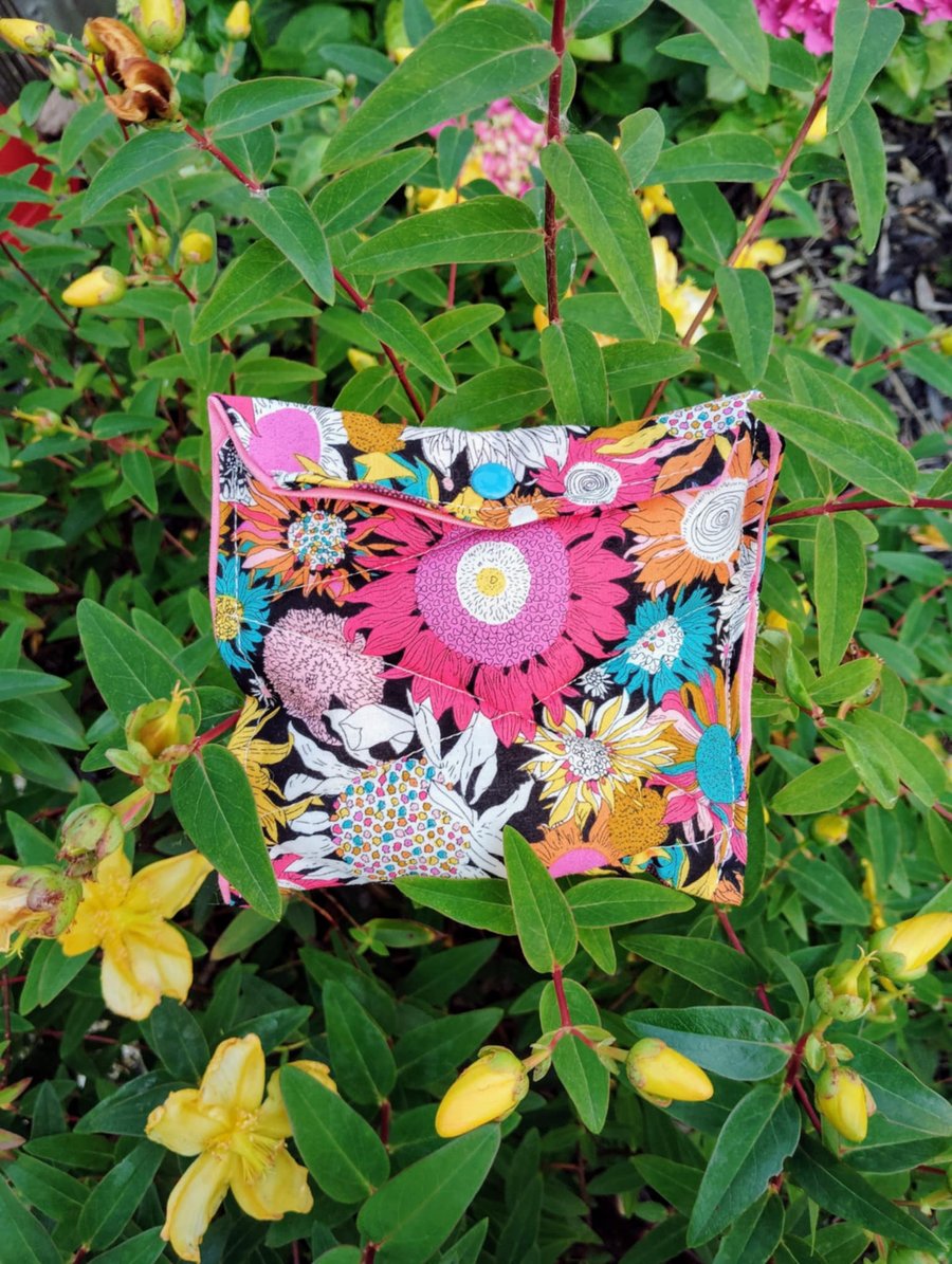 Handmade funky flowers quilted fabric purse with blue popper fastening