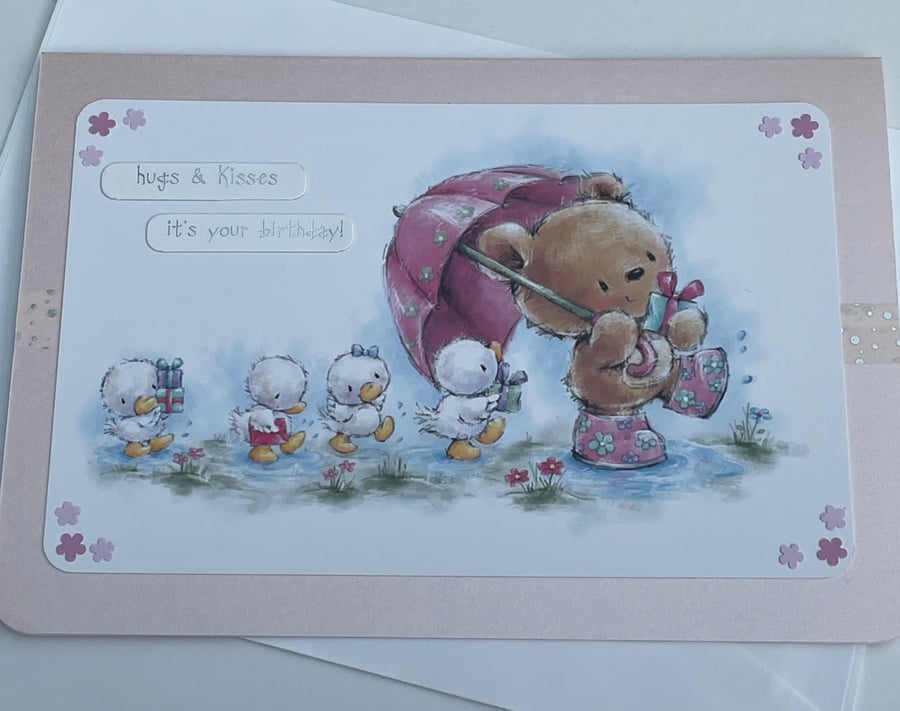 Hugs and kisses bear and ducks on a rainy day Happy Birthday card