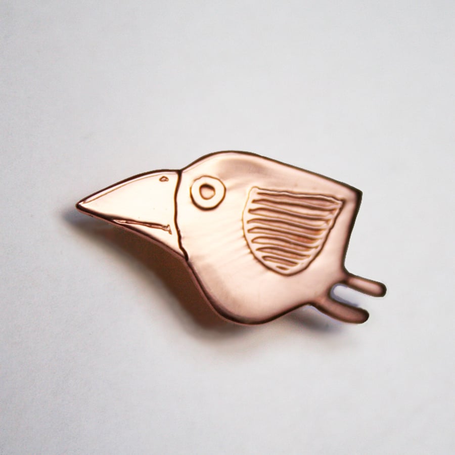Bird brooch, pink copper