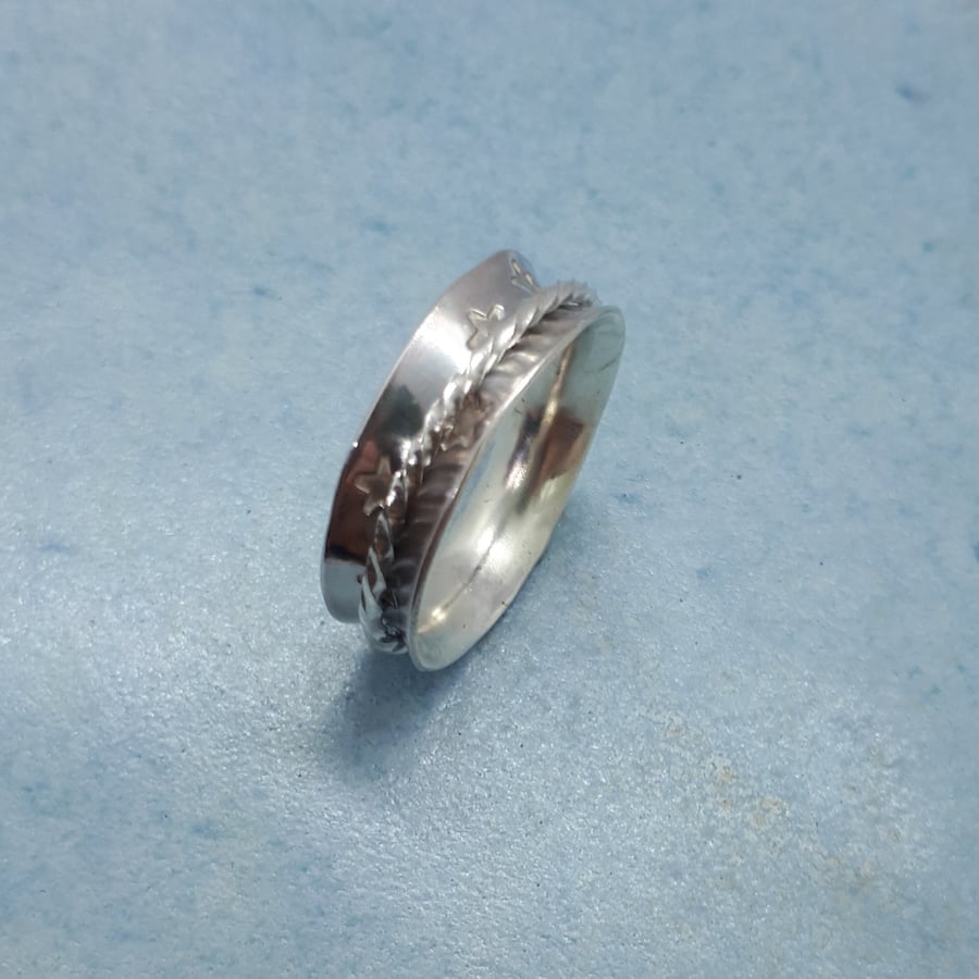 Stars and twisted silver narrow spinner ring