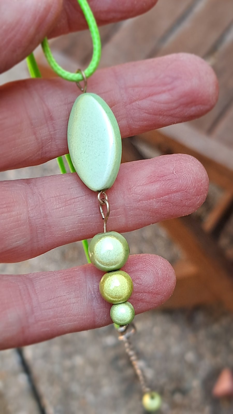 Rope necklace with a selection of disco beads