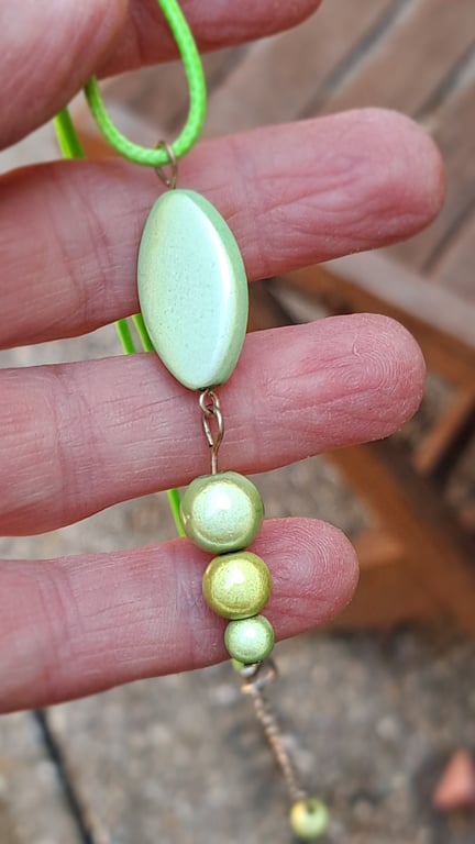 Rope necklace with a selection of disco beads