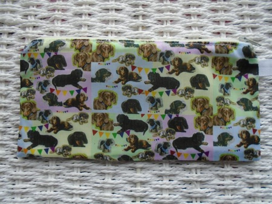Lots of Sausage Dogs Pencil Case or Small Make Up Bag.
