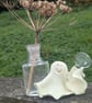 Dougal - vintage glass bud vase held by glow in the dark ghost