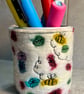 Bees and flowers pen pot