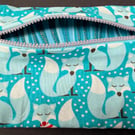 Small funky zipped pouch with charming foxes on light turquoise