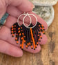 Halloween fringe hoop earrings in orange and black - Image 3