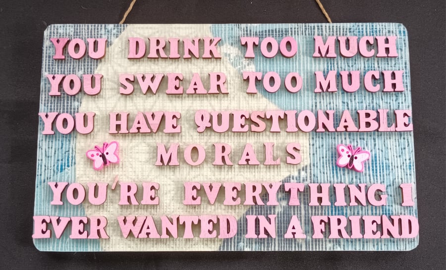 Hand decorated hanging wooden sign 