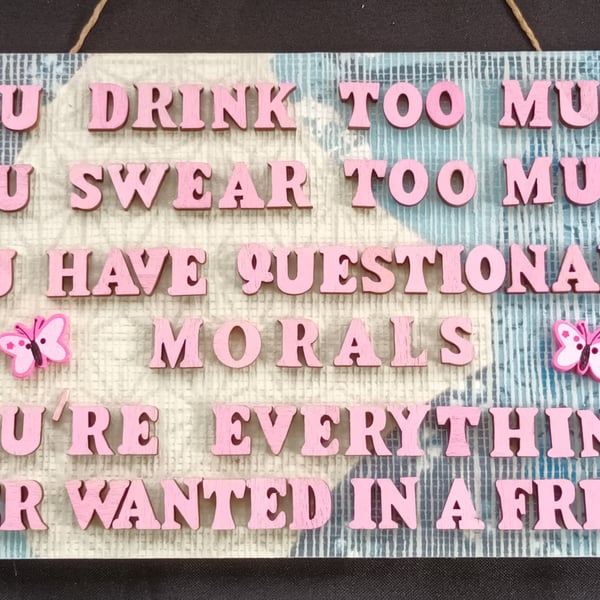 Hand decorated hanging wooden sign 