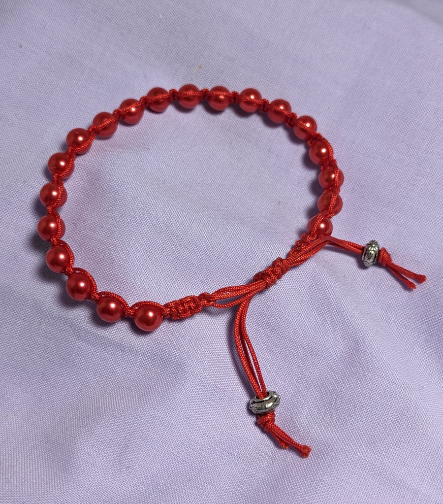 Red beaded macrame bracelet