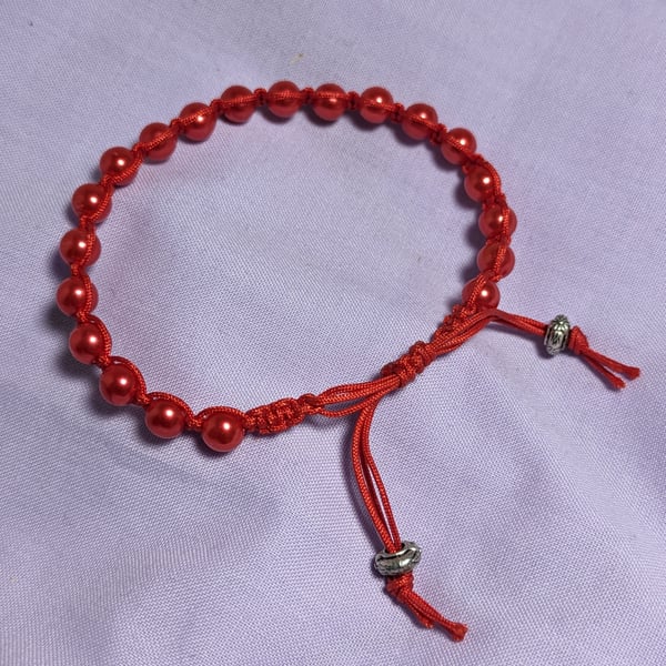 Red beaded macrame bracelet