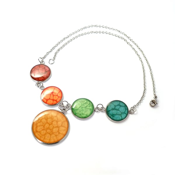 Rainbow necklace with larger central pendant on Stainless Steel chain
