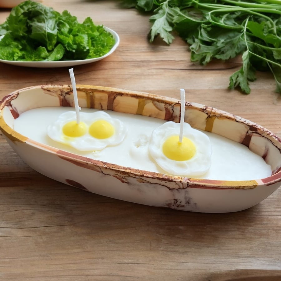 Soy wax decorative fried eggs on a pot candle 