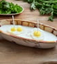 Soy wax decorative fried eggs on a pot candle 
