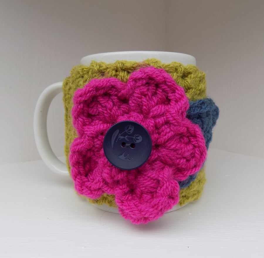Mug with Chunky Hug Cosy with Large Crochet Flower Winter Berry Colours