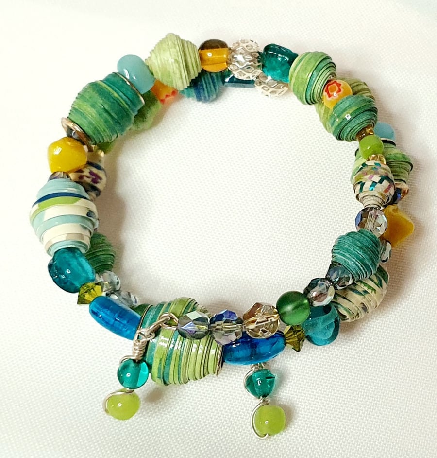 Sea inspired sparkly memory wire paper beaded green, yellow and blue bracelet 