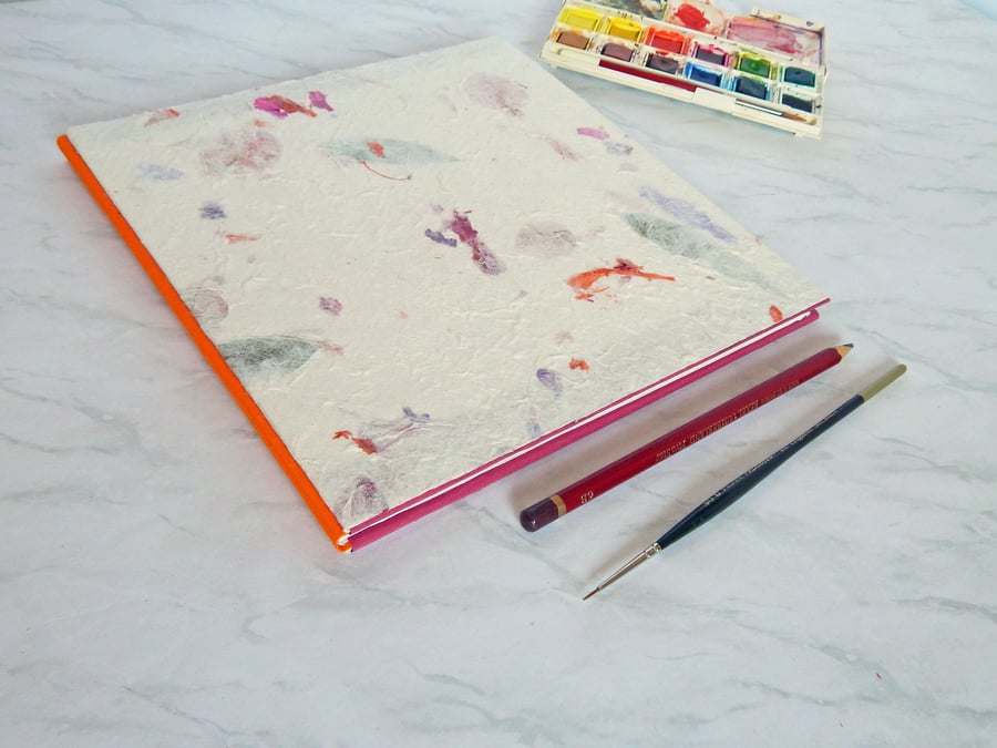 Sketchbook with Khadi paper. Handmade flower paper covers, orange spine. 