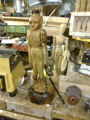 side lamp with a carved figure
