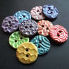 Set of ten little handmade ceramic buttons