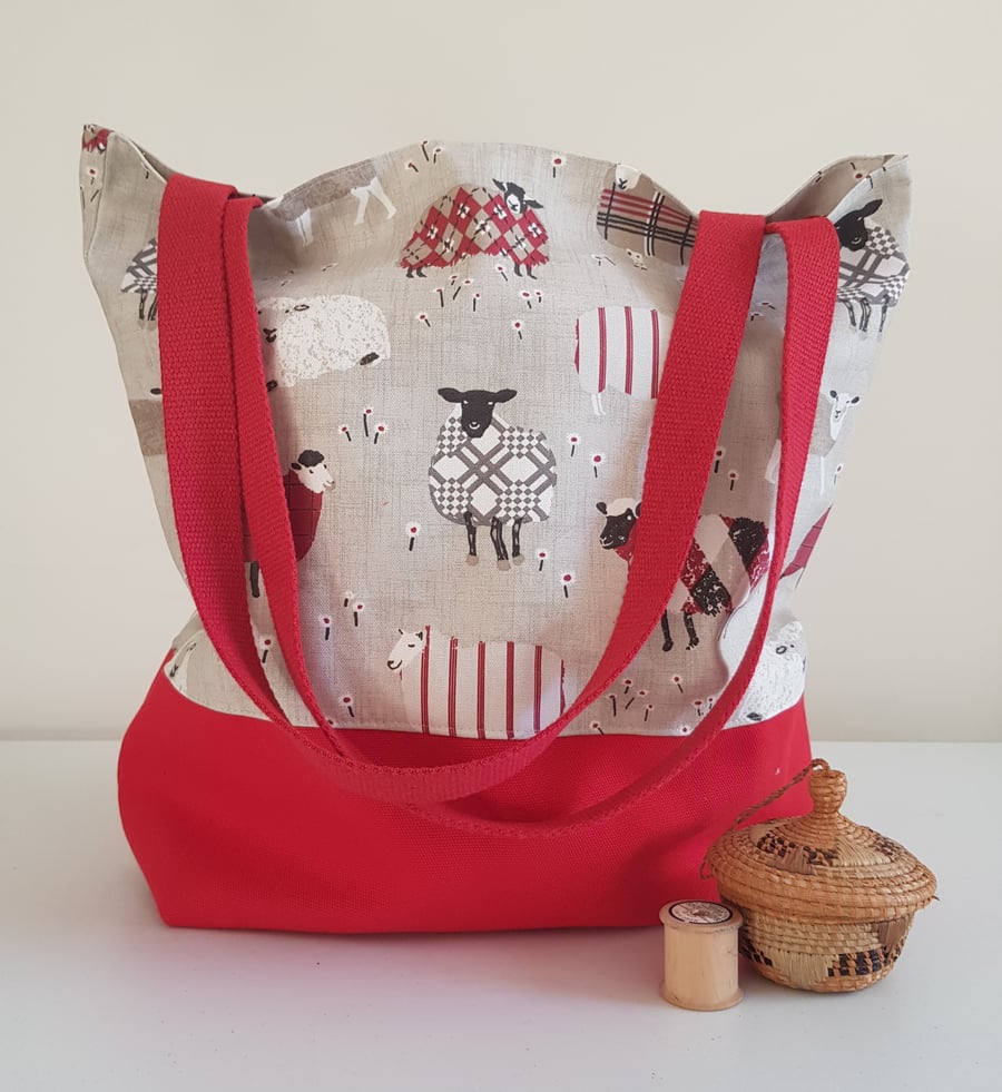 Tote bag:  large and fully lined,  sheep design with red  canvas base