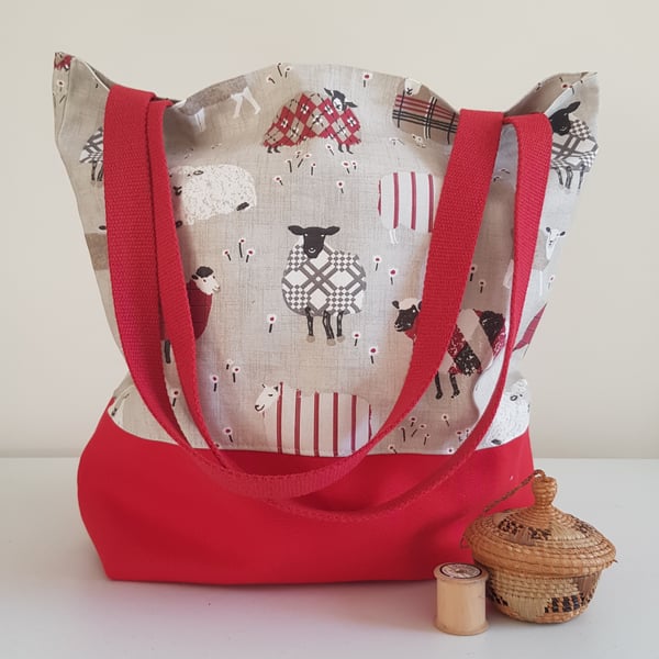 Tote bag:  large and fully lined,  sheep design with red  canvas base