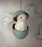 Paper mache sheep in an eggshell assemblage art - Image 1