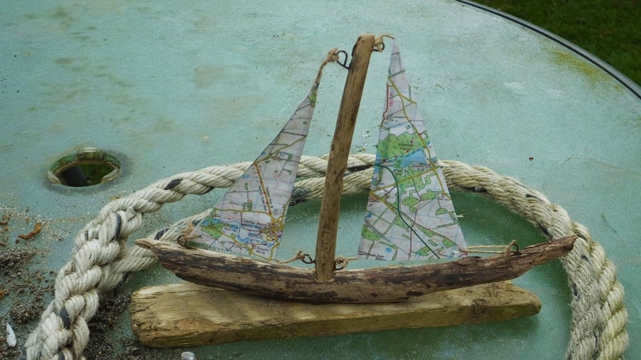 Driftwood sailing ship yacht with ordnance survey map sails Norfolk area