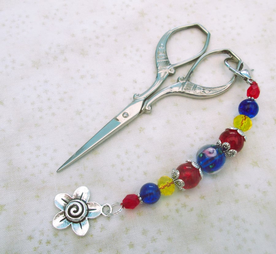 Red and blue scissor fob with flower charm, floral bag charm or zipper pull