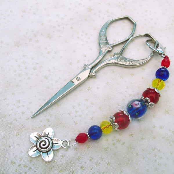 Red and blue scissor fob with flower charm, floral bag charm or zipper pull