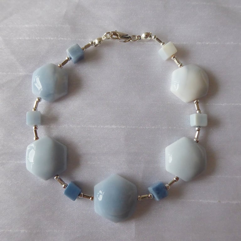 Blue Sky Sterling Silver Bracelet featuring Cube and Hexagonal blue Opals