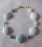 Blue Sky Sterling Silver Bracelet featuring Cube and Hexagonal blue Opals