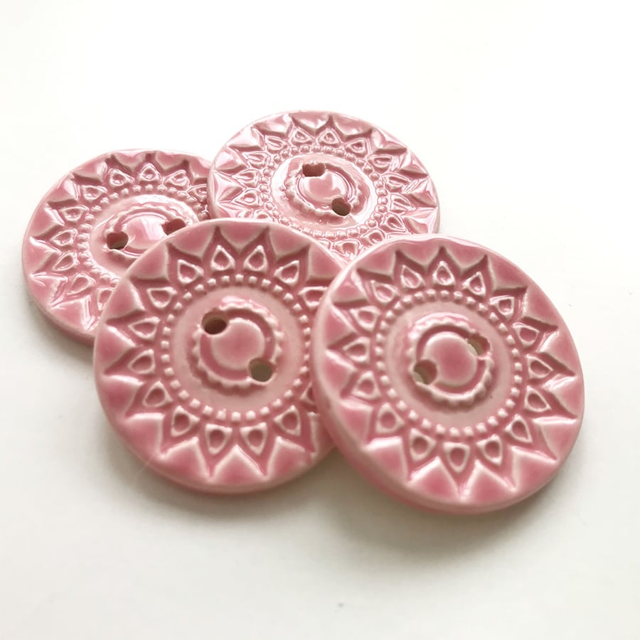 Set of four pink ceramic handmade buttons