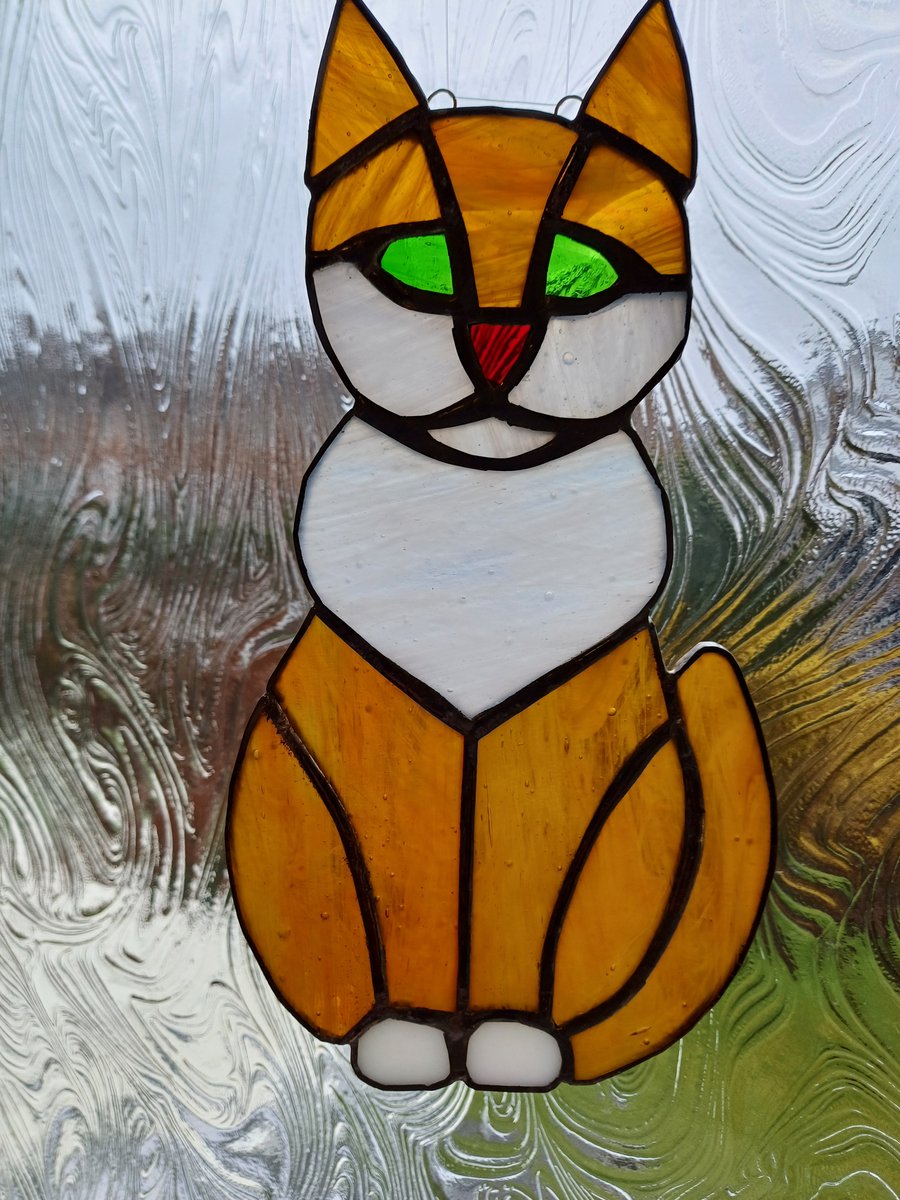 Handmade ginger and white stained glass cat