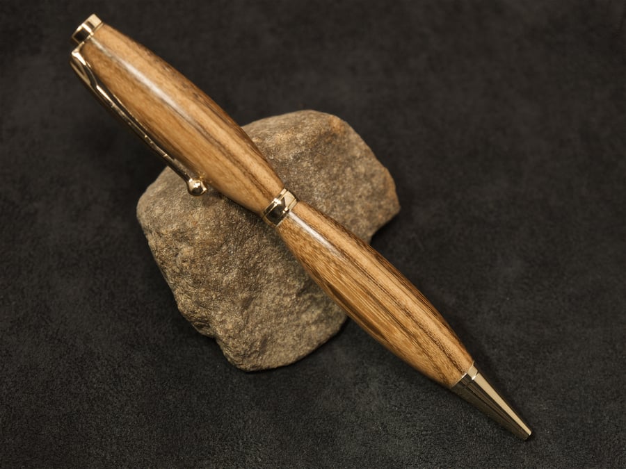 Hand crafted yew rollerball twist-pen. R5,6