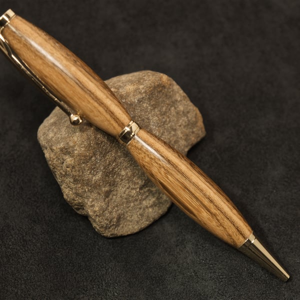 Hand crafted yew rollerball twist-pen. R5,6