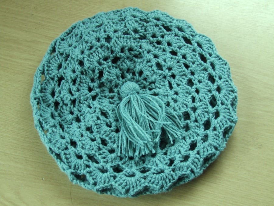 Sage green ladies crotchet beret style hat in acrylic doudle knitting wool.