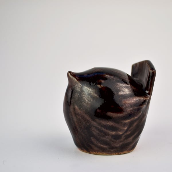 Shiny brown ceramic wren