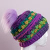 Cute crochet hat with handmade faux fur pompom rainbow bright