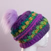 Cute crochet hat with handmade faux fur pompom rainbow bright