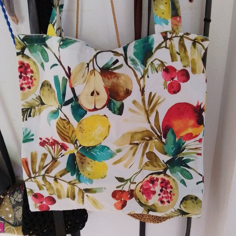 Handmade tote bag in a vivid fruit design.