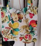 Handmade tote bag in a vivid fruit design.