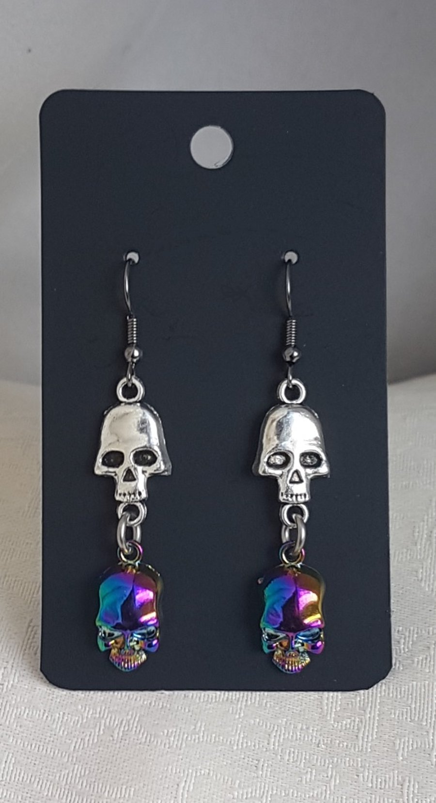 Double Skulls Dangly Earrings - Gun Metal Ear Wires.