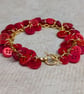 Red button bracelet with gold chain and toggle clasp  - Image 8