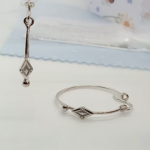 Sterling silver hoop earrings diamond bead design detailing 