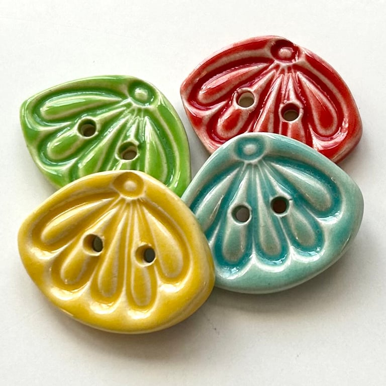 Set of four handmade ceramic buttons