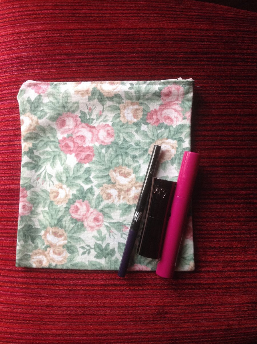 Pink and green floral purse