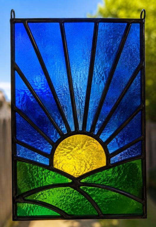 Stained glass sunrise panel